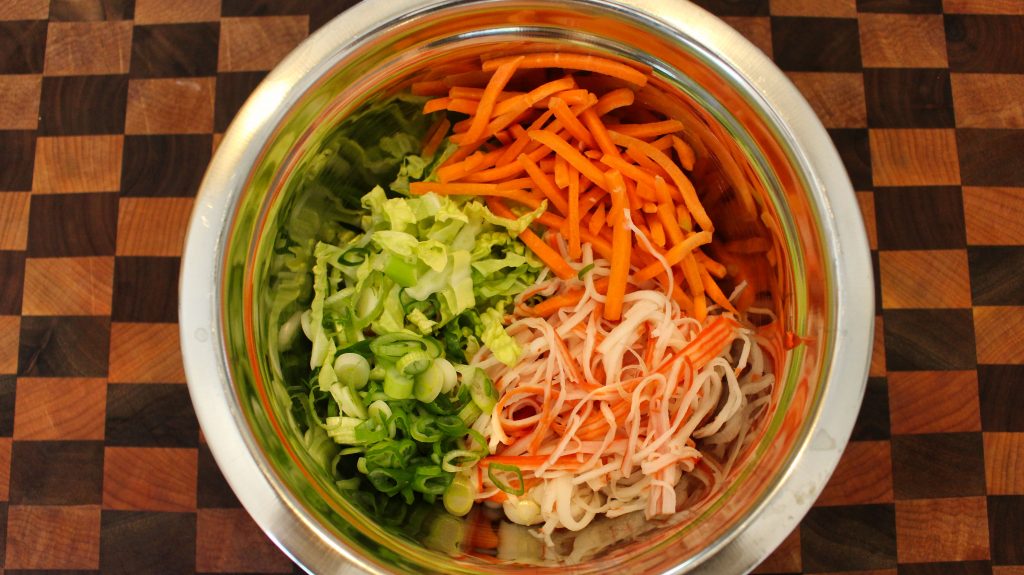Crab, carrots and cabbage ready to mix